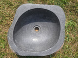 Natural oval stone basin