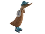 Wooden duck with spotty wellies and hat