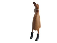Wooden duck with floral wellies