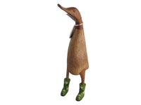 Wooden duck with floral wellies