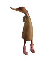Wooden duck with floral wellies