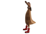 Wooden duck with floral wellies