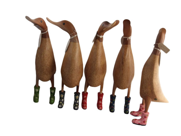 Wooden duck with floral wellies