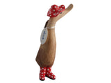 Wooden duck with spotty wellies and hat